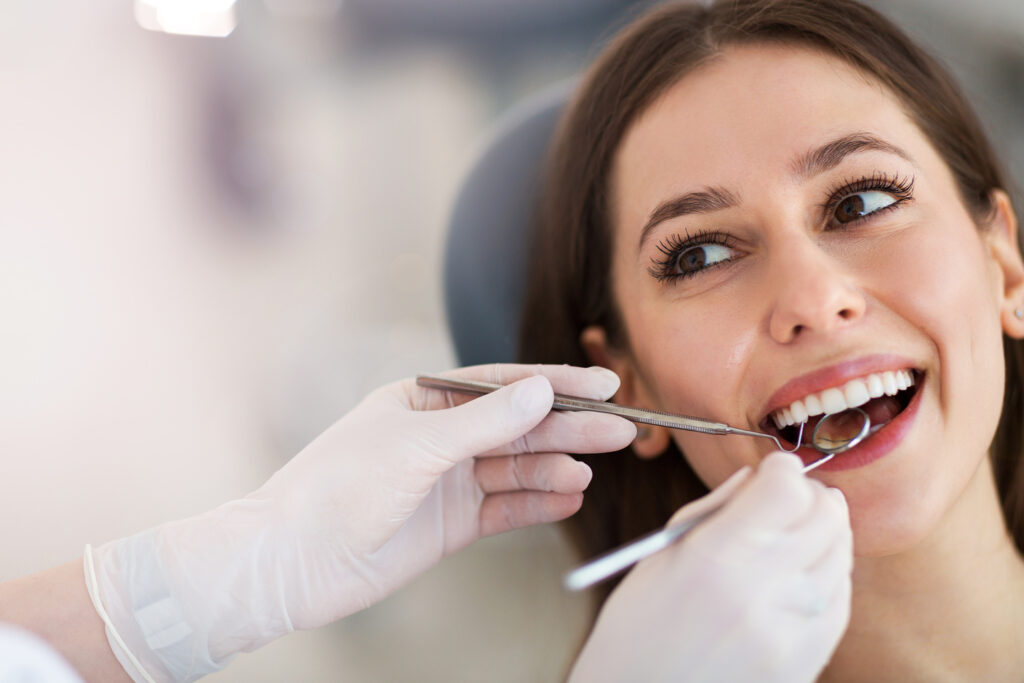 Woman receiving a professional teeth cleaning at Noel Dental Arts in Huntsville, AL Woman receiving a professional teeth cleaning at Noel Dental Arts in Huntsville, AL